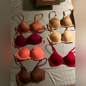 Seven Victoria Secret bras, all 32C but all bands measures like 34 bands
